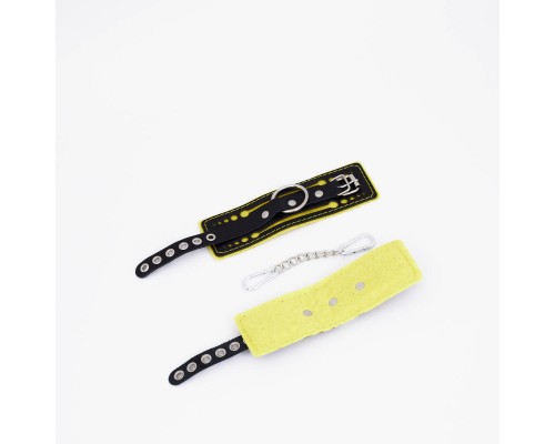 Оковы с жёлтой строчкой