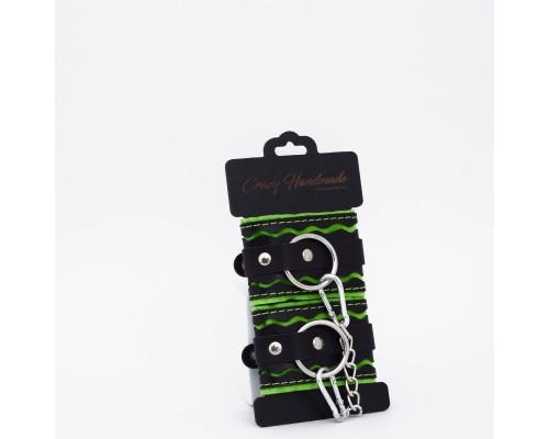 Наручники с зелёной строчкой